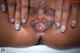 A close up of a woman's butt with her hands on her hips.